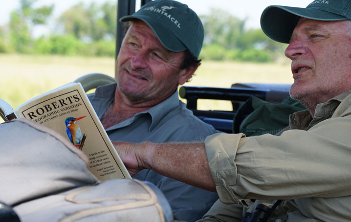 The Tett brothers studying birds on safari.