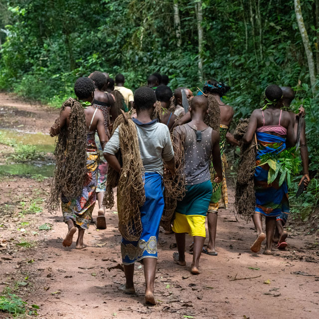 The BaAka people setting out to hunt.