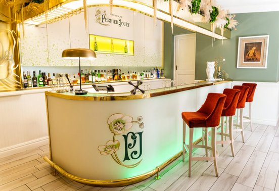 Perrier-Jouët branded Muse Champagne Bar with gold bar counter and velvet stools at Fairlawns Boutique Hotel and Spa, Johannesburg