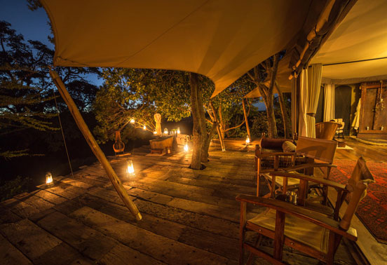 A tent at night at Mara Plains camp.