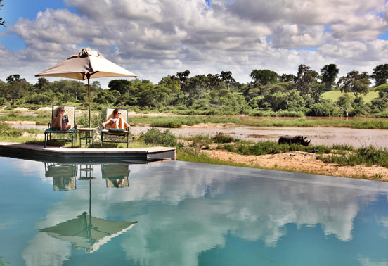 Ladies enjoying the pool at MalaMala.