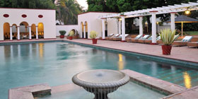 Swim at the Victoria Falls Hotel.
