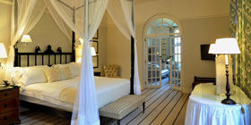 A bed at Victoria Falls Hotel.