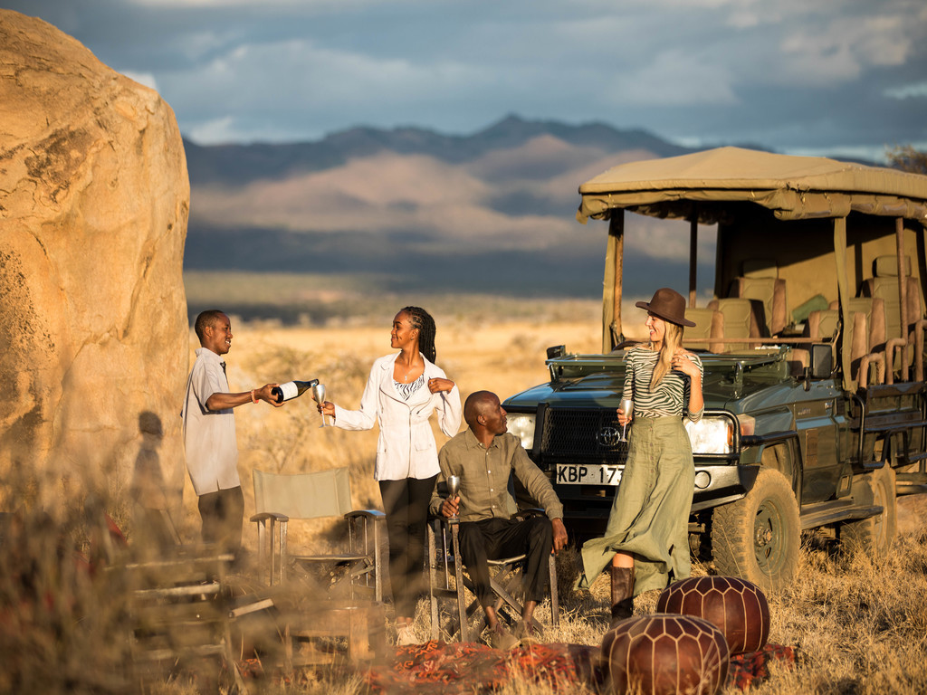 People enjoying sundowners at Ol Donyo Lodge.
