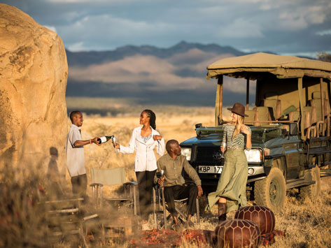 People enjoying sundowners in Africa.