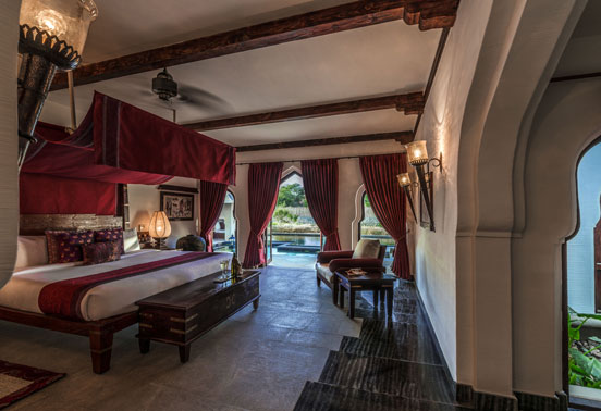 A bedroom at the Lotus Mahal