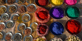 Spices and jewelry in a Khajuraho market