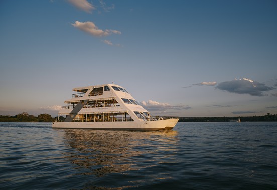 Lady Livingstone cruise vessel sailing the Zambezi River at golden hour, Livingstone, Zambia